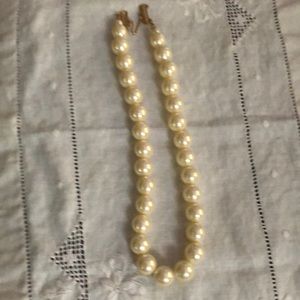 Pearl necklace.  16”